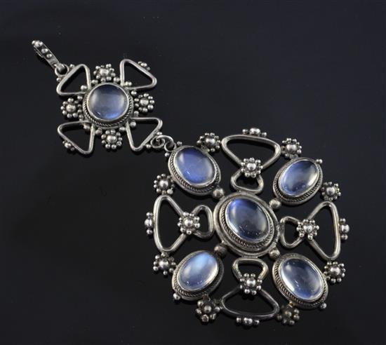 An early 20th century Arts & Crafts silver and moonstone drop pendant, overall 3.75in.